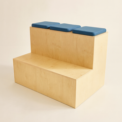 Wooden step with blue cushioned seats on a beige background